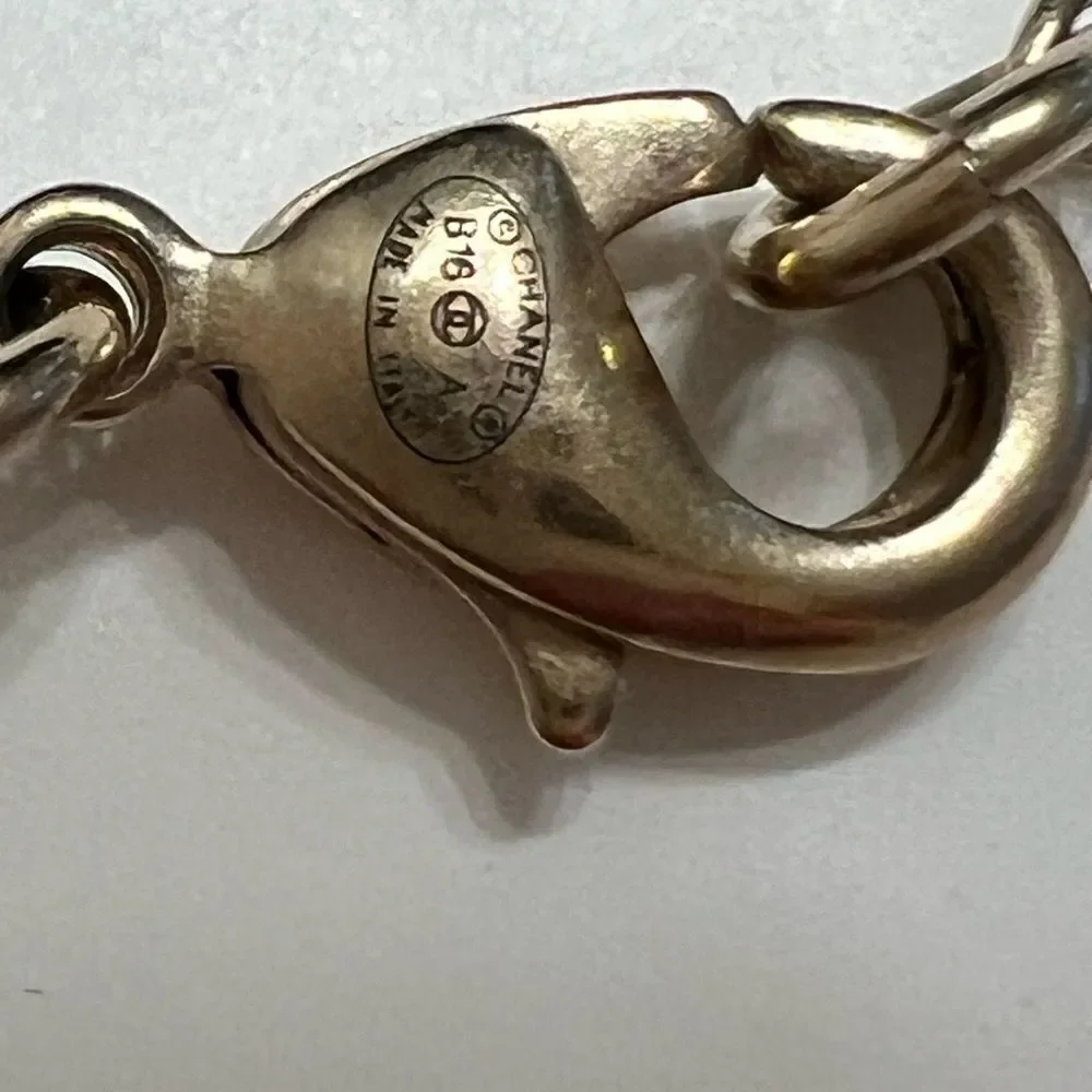 Chanel gold and black pearl CC pendant necklace, Authentic